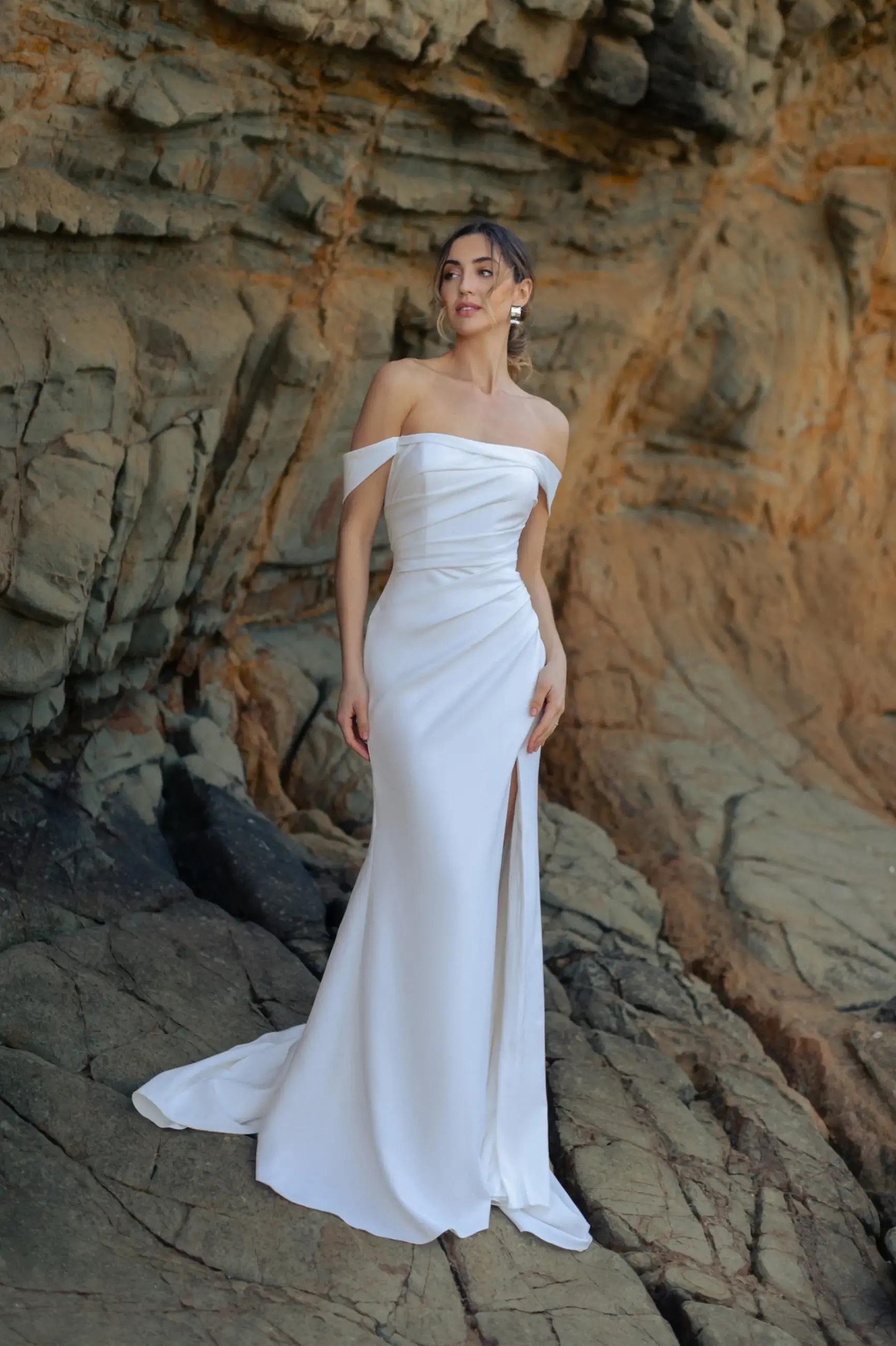 Model wearing a gown by Wilderly Bride